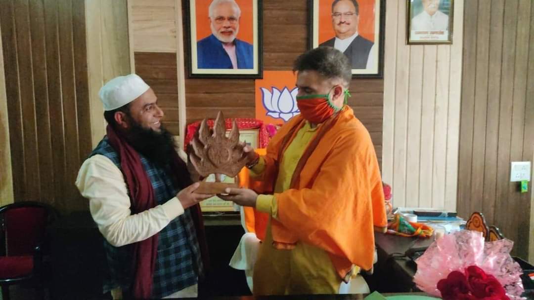 BJP leader Javed Qureshi met with the party president  Ravinder Raina