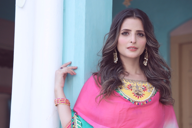 A Kashmiri Model and Dentist shooting for the stars