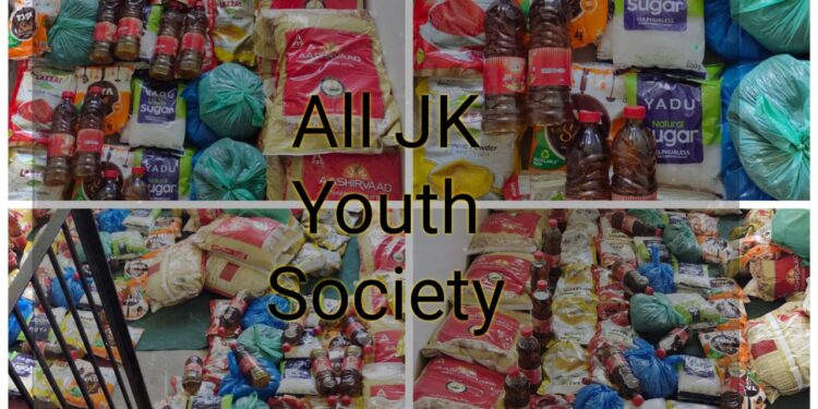 Kashmir based NGO starts distributing food kits to families struggling with hunger in COVID’s second wave with a message – “Keep your cameras at home while helping people”.