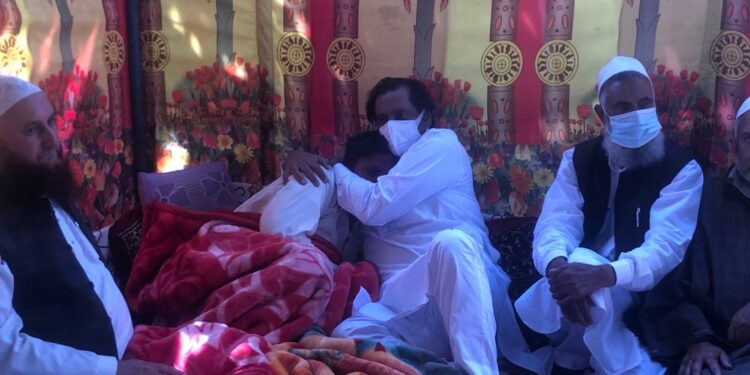 Sajad Lone visits slain cop’s family in Kupwara