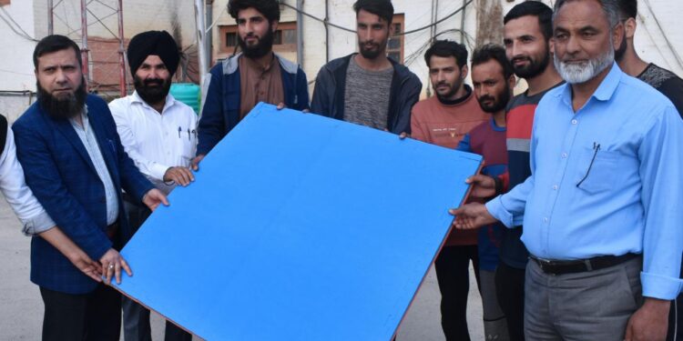 DC Kupwara distributes sports material among beneficiaries at Kupwara