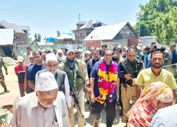 Sajad Lone visits Handwara, urges workers to intensify outreach efforts